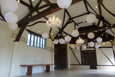 White Paper Lanterns with Chandeliers and Festoon Lights