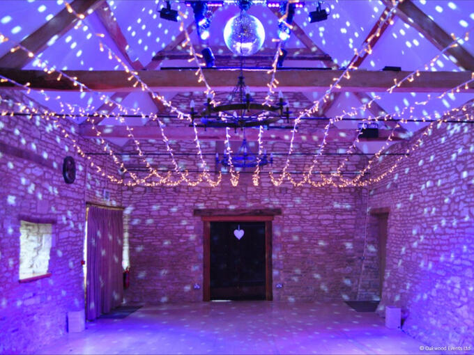 Caswell House disco lights and mirror ball with fairy light canopy