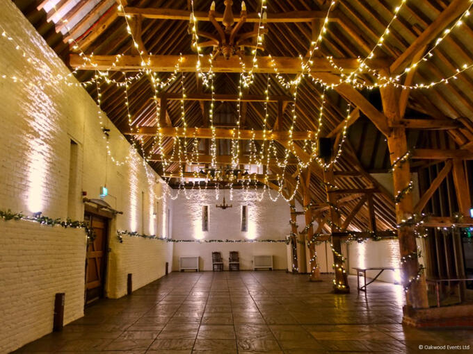 Multiswag fairy light canopy and uplighting at Ufton Court