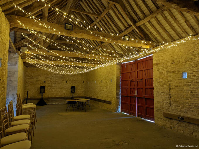 Cogges Manor Farm fairy light canopy in the Barley Barn