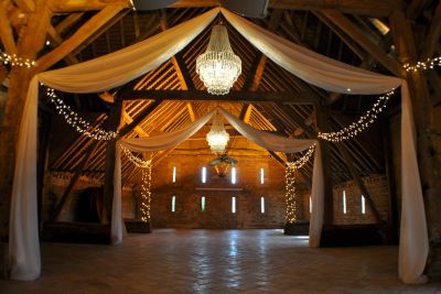 Fabric Drapes with Chandeliers and Fairy Lights